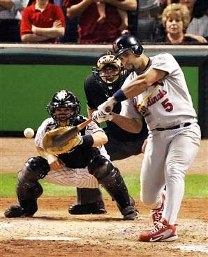 Albert Pujols hitting an outside pitch. Notice the eyes, hands, and feet. Awesome!!!